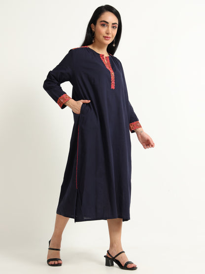 Navy blue dress with red detailing