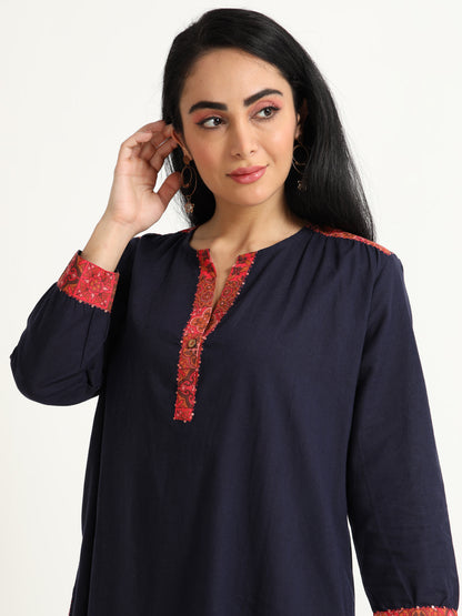 Navy blue dress with red detailing
