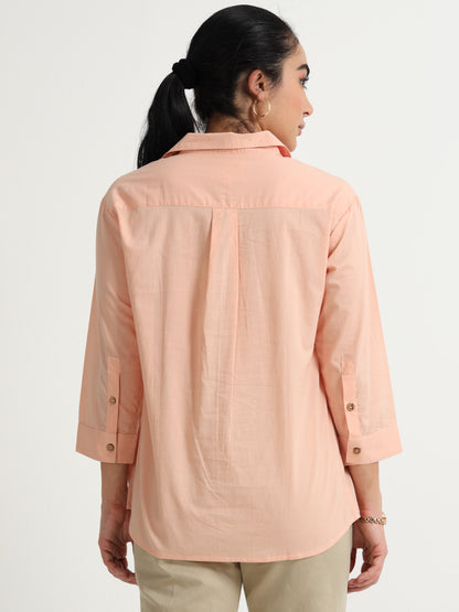 A Spanish Pink Top With a Floral Embroidery Mottiff