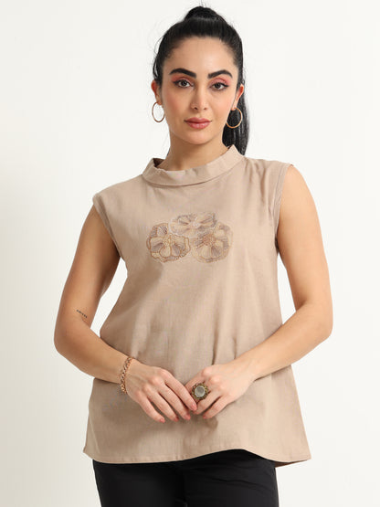 A Simple Sleeveless Top With Thread Embroidery Detailing