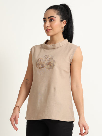 A Simple Sleeveless Top With Thread Embroidery Detailing