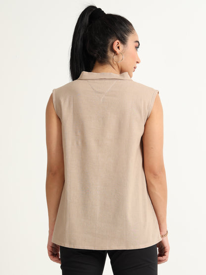 A Simple Sleeveless Top With Thread Embroidery Detailing