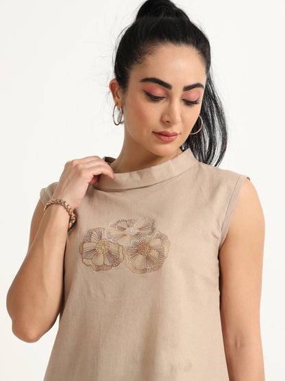 A Simple Sleeveless Top With Thread Embroidery Detailing