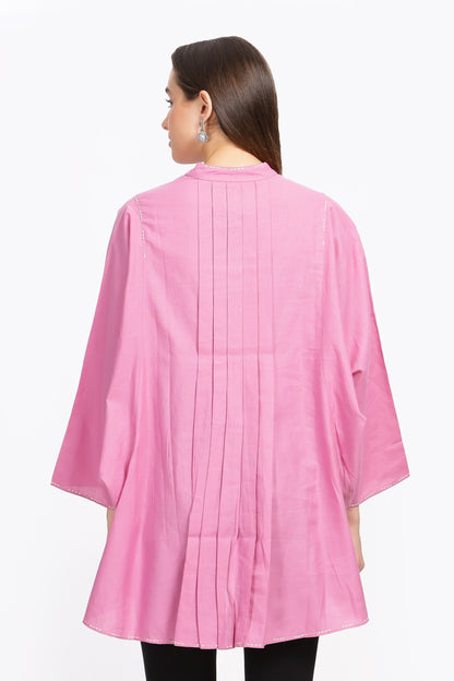 pink dolman sleeved shirt